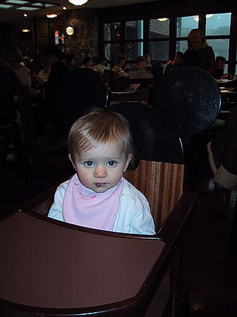 Jessica in her Mickey Mouse high chair
